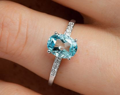 An aquamarine engagement ring